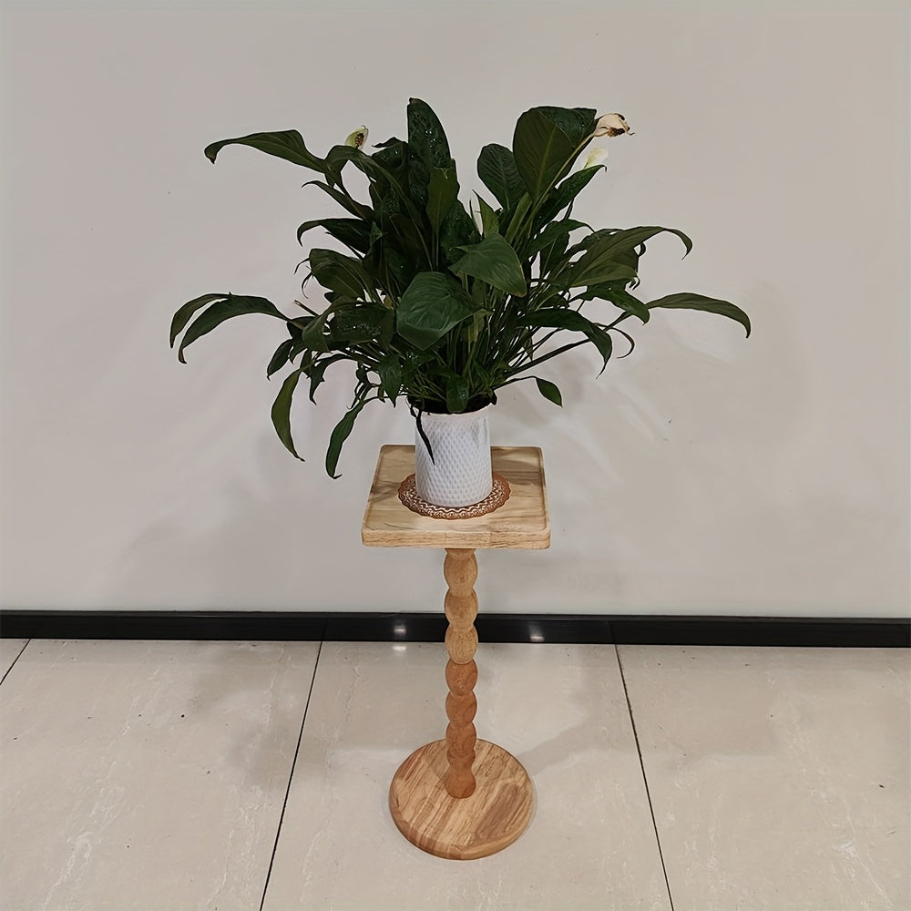 Guéridon en bois massif au pied torsadé sculpté