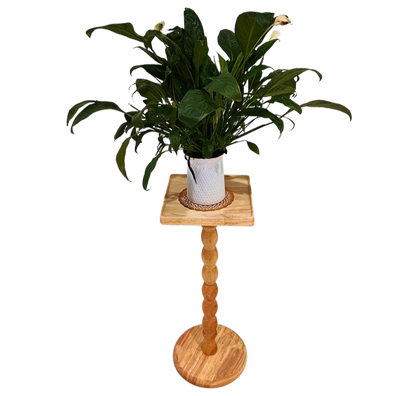 Guéridon en bois massif au pied torsadé sculpté