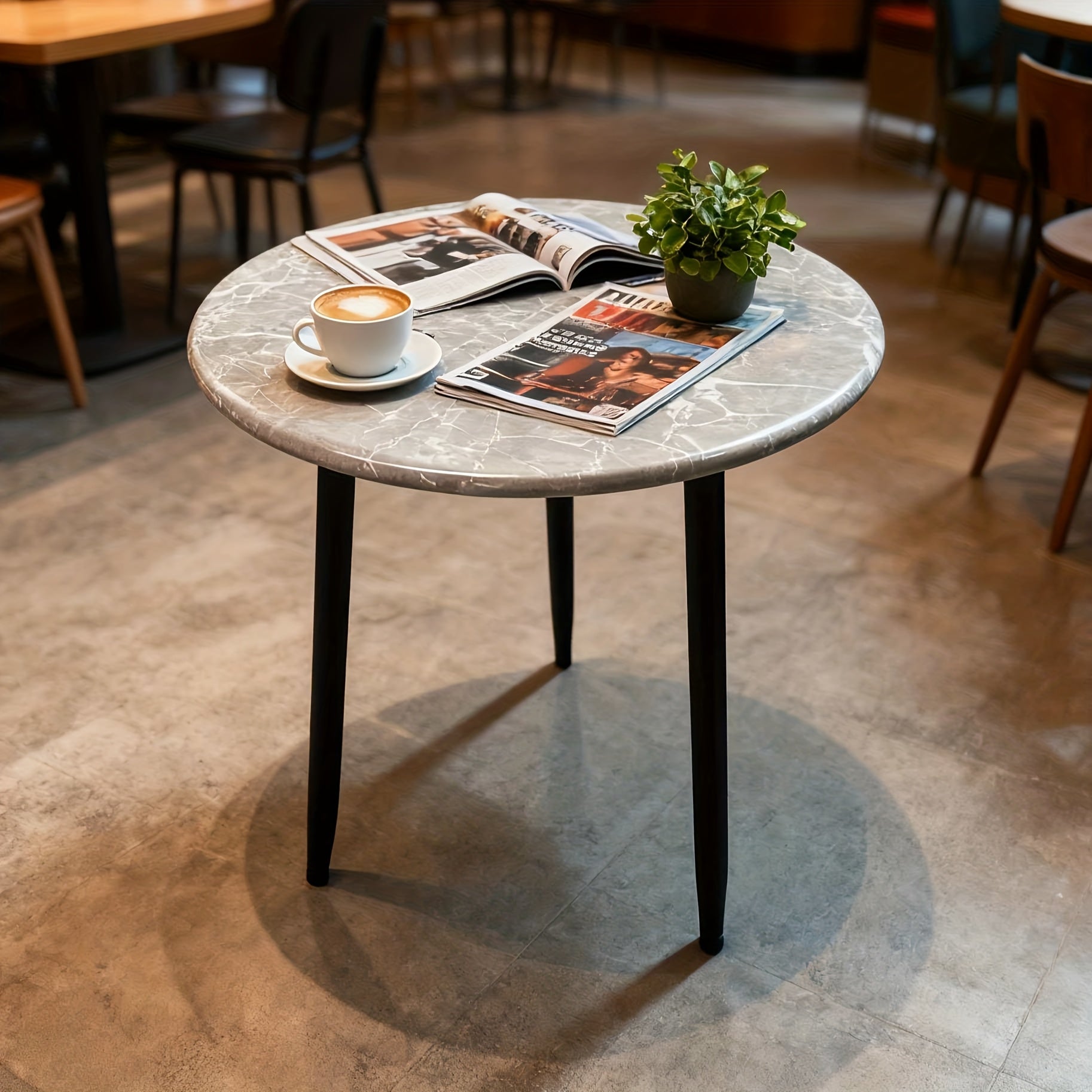 Bout de canapé rond effet marbre et métal noir