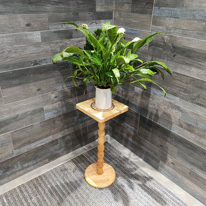 Guéridon en bois massif au pied torsadé sculpté